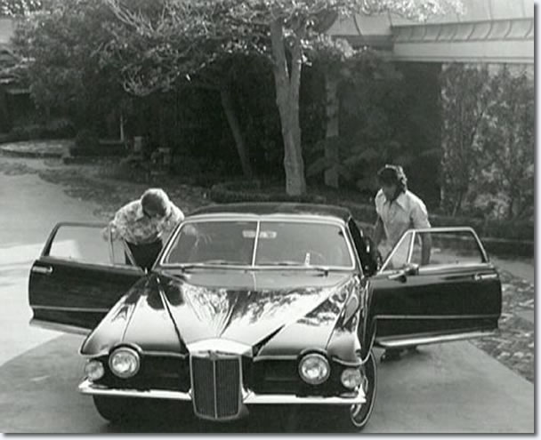 Elvis with his 1971 Stutz Blackhawk production model - 144 Monavale Street, Beverly Hills - September, 1971